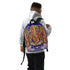 A boy wearing a Cosmovisions-AI Ganesh Hindu backpack.