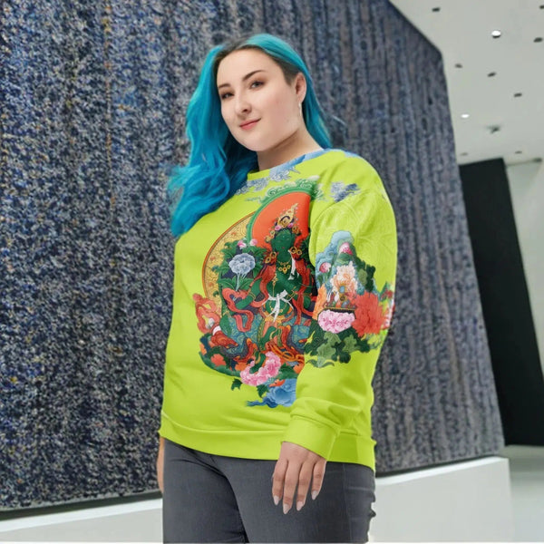 A woman with blue hair wearing a Green Tara Thangka Unisex Sweatshirt by Cosmovisions-AI.
