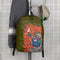 "Backpack from Thangka Yama Collection symbolizing life cycle"