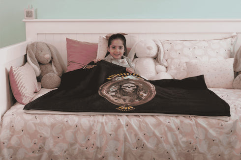 Cosmovisions Collection - Blanket embodying Santa Muerte Negra's spirituality