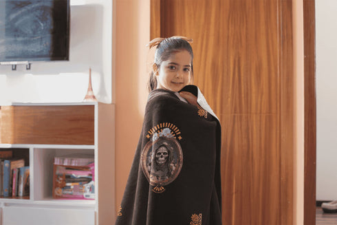 Cosmovisions Collection - Blanket embodying Santa Muerte Negra's spirituality